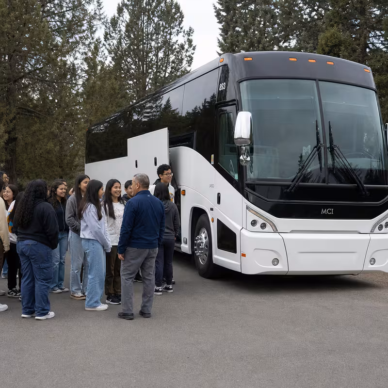 Black Mercedes Sprinter van staged for an St Paul School Transportation group