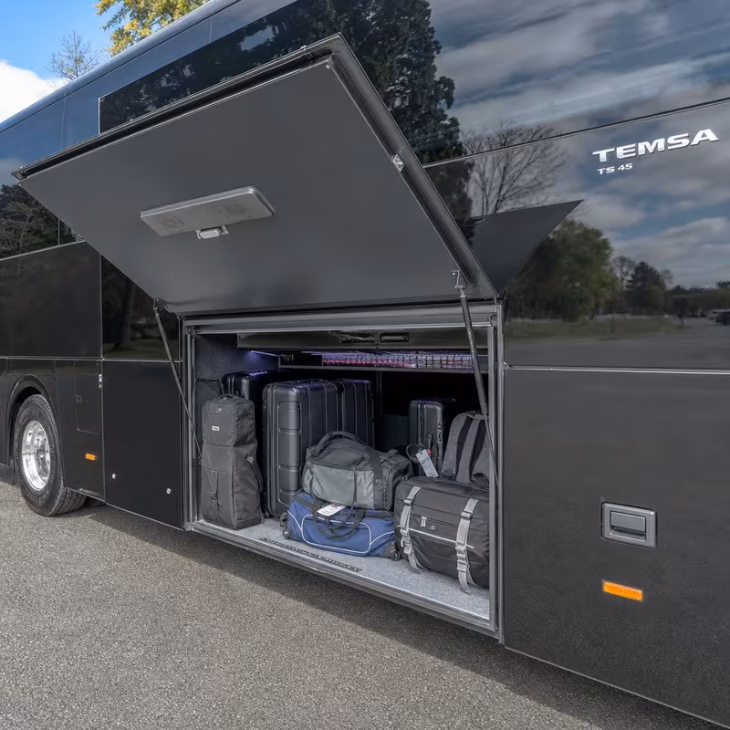 Party bus interior with wraparound leather seating and LED lighting in St Paul