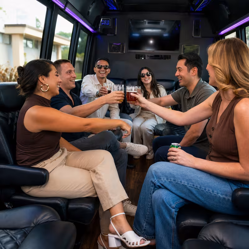 Group boarding a white charter bus for Winery & Brewery Tour Transportation transportation in St Paul