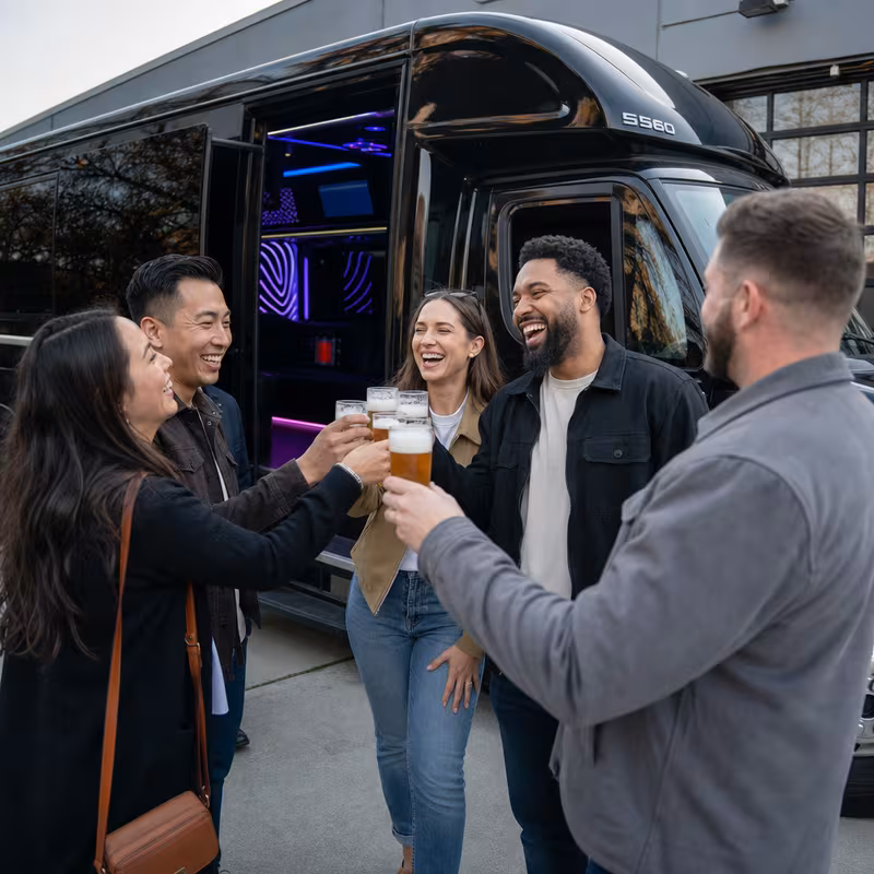 Passengers loading luggage while boarding an St Paul group shuttle